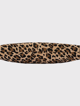 The fashionable Geena Straw Clutch Bag in leopard print boasts a half-moon design, a woven exterior, a detachable chain, and an internal pocket for added convenience.