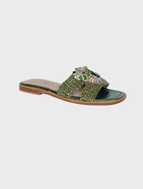 Gemma V in green, showcasing a stylish design with a vibrant hue and elegant silhouette.