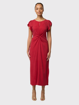 Midi dress in dahlia red, presenting a twist-front style, petal sleeves, and side splits to promote greater mobility.