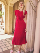 Dahlia red midi dress featuring a twist-front neckline, petal sleeves, and side splits for ease of movement.