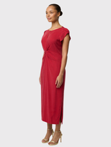 Stylish Geneva dress in dahlia red, featuring a twist-front neckline, flowing sleeves, and side splits for added movement.