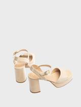 Elegant women's nude leather sandal by Giardino, featuring a sturdy block heel for added comfort and style.