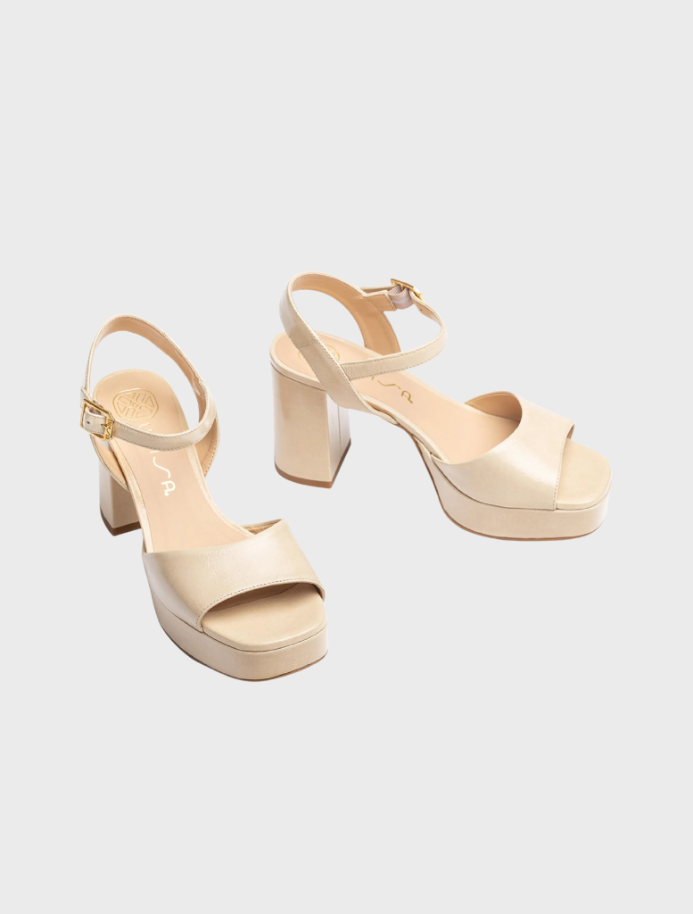 Giardino women's nude leather sandal with a wide block heel offering a chic and comfortable footwear option.
