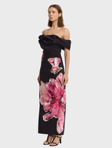 Garnet Magnolia Gifford Maxi Dress, showcasing a rich garnet hue with a stylish, flowing silhouette and floral accents.
