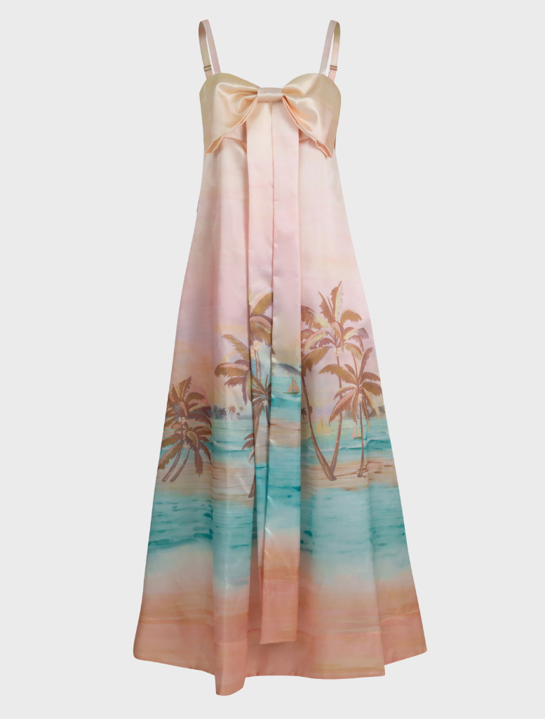  A sunset-inspired dress with a decorative bow at the waist, combining elegance and contemporary fashion.