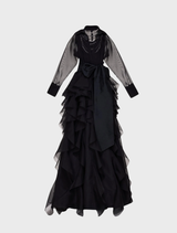 Black dress with ruffled sleeves and a bow, named Gizele Elbise, elegantly displayed on a neutral background.