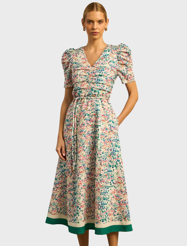 Elegant Glimmer Dress in a marble pattern, featuring a flowing silhouette and delicate fabric for a sophisticated look.