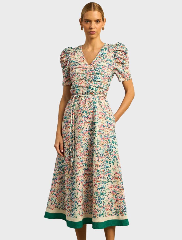 Elegant Glimmer Dress in a marble pattern, featuring a flowing silhouette and delicate fabric for a sophisticated look.