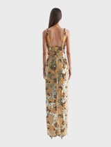 Beautiful gold Elyse gown with a sophisticated cut and shimmering fabric, suitable for glamorous occasions.