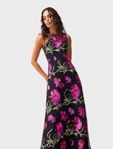 Black gown featuring vibrant pink floral designs, perfect for formal occasions and elegant events.