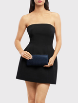 Navy GRACE Envelope Clutch adorned with crystals, includes a shoulder chain and slip pocket, perfect for carrying essentials.
