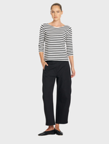 Black Barrel Leg Pant made from Gravitene fabric, featuring a flat-front waistband, elastic back, and side pockets for comfort.
