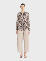 Fawn Barrel Leg Pant made from Gravitene fabric, featuring a flattering silhouette, elastic back, and side pockets for comfort.