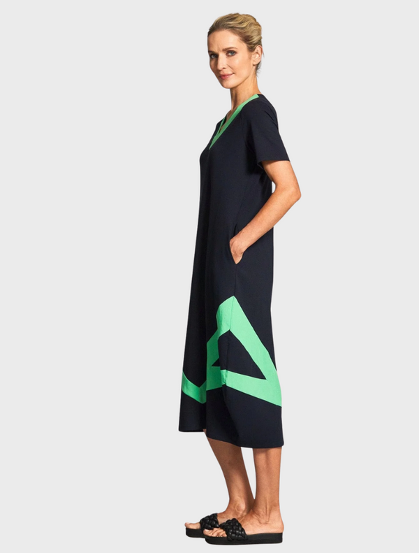 Elegant black and green dress with a flattering v-neckline.