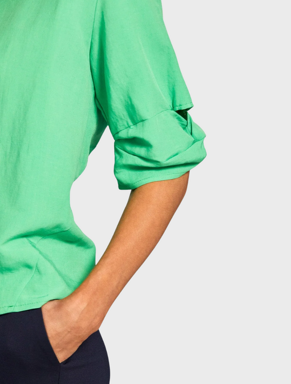 A short-sleeved green top with a comfortable fit, perfect for warm weather.