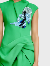 Stylish green Yelford Mini Dress, designed with a fitted shape and short sleeves, suitable for various occasions.
