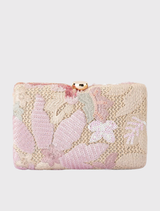 A vibrant GRETA Floral Clutch with floral details, structured hardcase, and detachable chains for versatile styling options.
