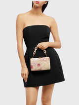 Colorful GRETA Floral Clutch with floral accents, hardcase design, and detachable shoulder chain for multiple styling choices.
