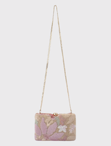 GRETA Floral Clutch features vibrant floral embellishments, a structured design, and includes a matching acrylic chain handle.