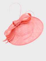 Chic pink Haisley fascinator with intricate floral embellishments, suitable for weddings or special gatherings.