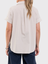 Lightweight Half Zip Shirt by Mela Purdie in Hay, showcasing a zip collar, short sleeves, and a comfortable cotton blend.
