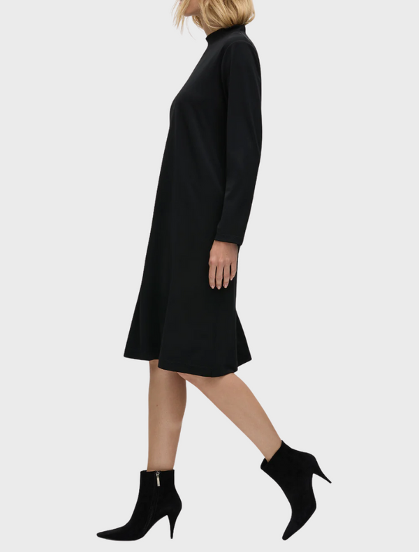 A black dress made from soft, stretchy fabric, showcasing a comfortable and form-fitting design.