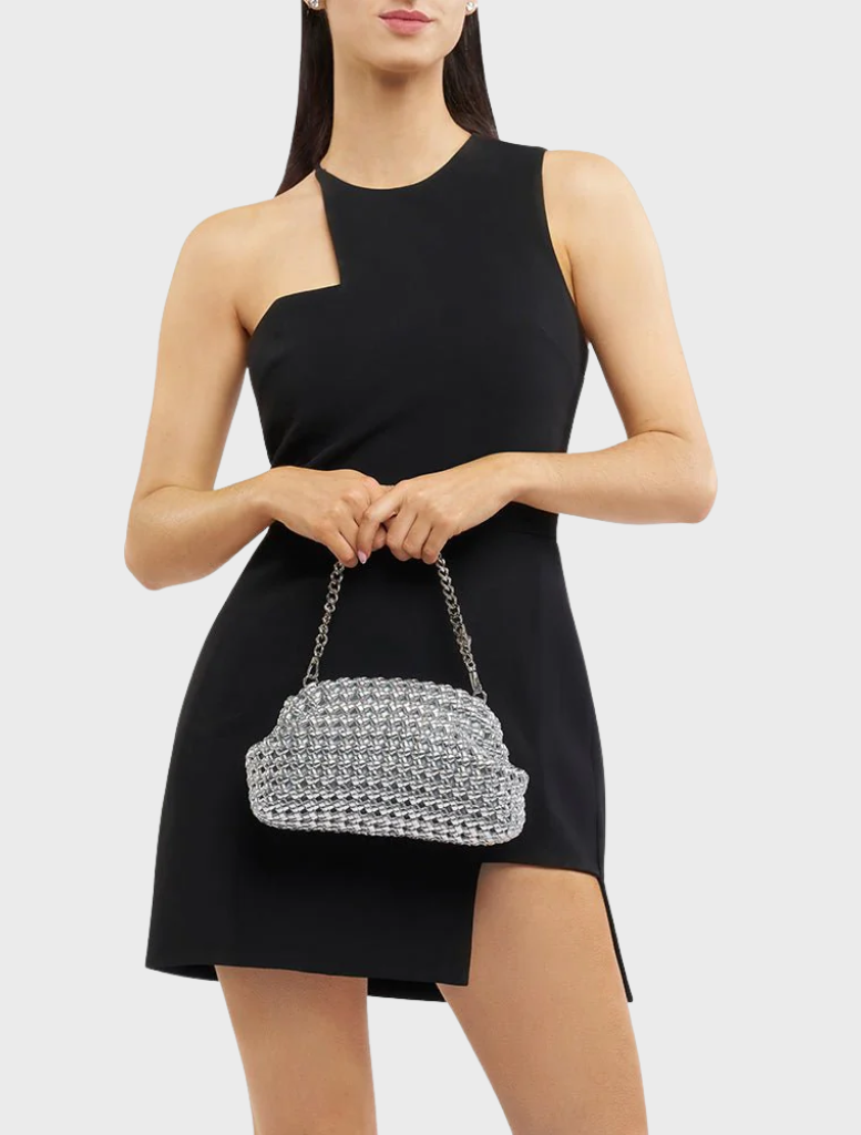 A chic silver clutch bag showcasing a fashionable chain design, perfect for complementing formal attire.