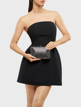 Hannah's gunmetal clutch with a textured finish, ideal for evening events and stylish outings.