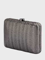 Textured gunmetal clutch from Hannah, designed for sophistication and versatility in formal wear.