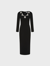 Elegant black midi dress with long sleeves, designed for a flattering fit, perfect for both casual and formal events.