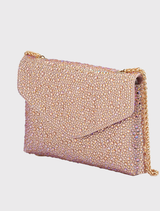 Glamorous peach Hattie Crystal Bag with crystal embellishments, magnetic closure, and a shoulder chain, designed for special events.