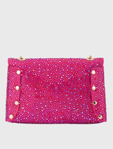 A trendy fuchsia Hattie Crystal Bag, showcasing crystals, gold-tone hardware, and a shoulder chain, is perfect for evening outings.