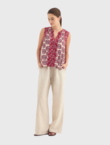 Haze Tank featuring a rounded V neckline, sleeveless design, and vibrant print, made from a soft rayon-viscose blend.
