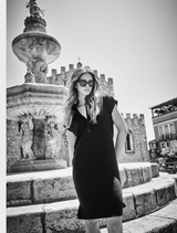Black dress with short sleeves, offering a timeless and versatile style.