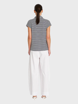 Striped Henley tank top in marine and white, highlighting a relaxed fit and versatile style for warm weather wear.