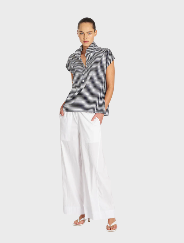 Marine and white striped Henley tank top displayed on a neutral background, showcasing its casual and stylish design.