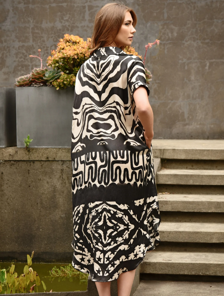 Chic black and stone dress showcasing a fashionable design, ideal for dressing up or down for any occasion.