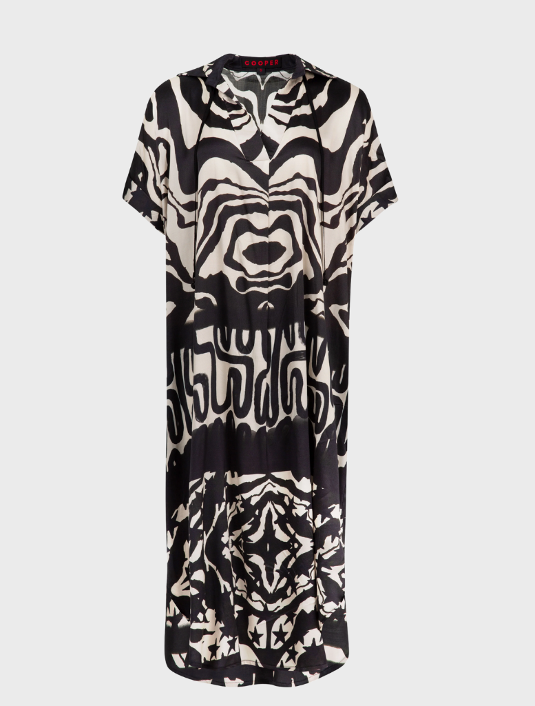 Elegant black and stone dress with a contemporary silhouette, perfect for both casual and formal events.