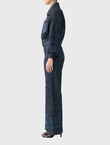 High-waisted flared jeans made of stretch denim, adorned with custom hardware and hand embroidery, offering off-duty ease.