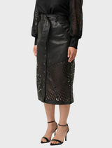 Elegant black leather midi skirt with a hypnotic lattice design, showcasing custom laser-cut detailing for a fashionable appeal.
