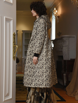 Trendy leopard print coat called "Ice To Meet You," ideal for adding flair to cold weather outfits.