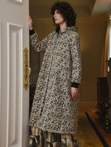"Ice To Meet You" coat in leopard print, combining elegance and warmth for a fashionable winter look.