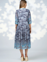Lightweight blue and grey floral dress, the Stevie Midi Dress in indigo multi, perfect for warm weather.