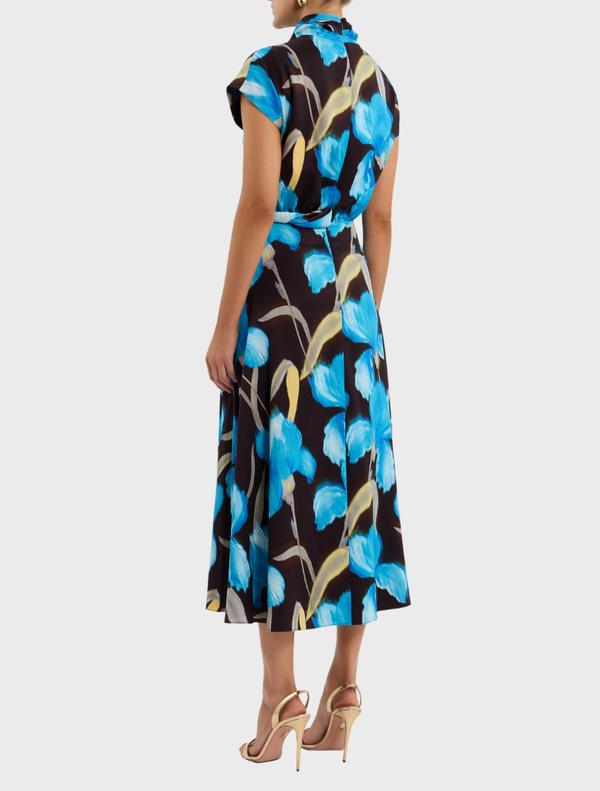 Blue iris floral print Ingrid midi dress, featuring a fitted bodice and flowing skirt, perfect for spring or summer occasions.