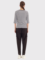 Relaxed 7/8 Soundtrack Pant in Ink offers a soft stretch fabric, elastic waistband, and adjustable cuffs for versatile styling.