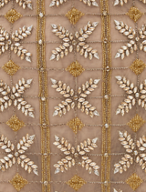  Iris Mini in metallic finish, showcasing a sleek design with a reflective surface and compact size.