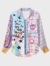 Eclectic Isabel shirt with Flower of Life pattern, mystical eye symbols, and bold text celebrating consciousness in vibrant colors.