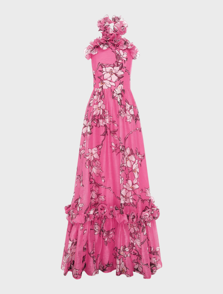 Halterneck maxi dress in pink magnolia print, designed with ruffles for a stylish and feminine look.