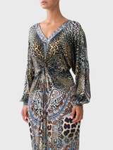  Trendy twist front dress showcasing an Istanbul Animalia motif, ideal for adding flair to any wardrobe.