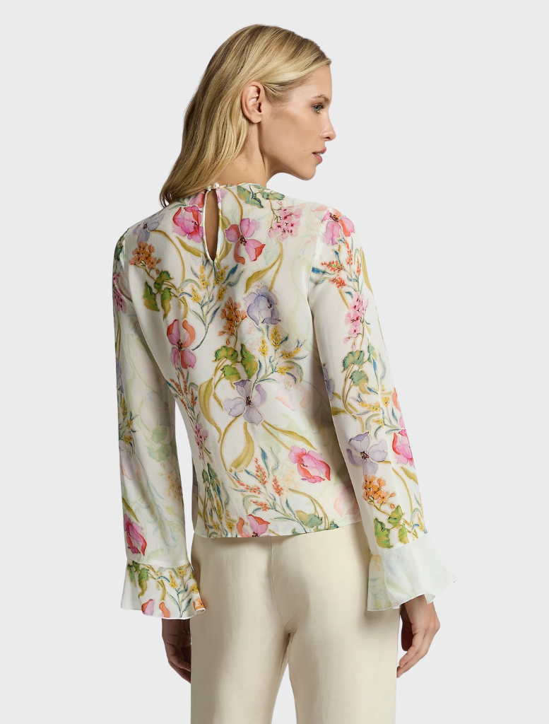 Feminine ivory top with a lovely floral motif, perfect for spring and summer wear.